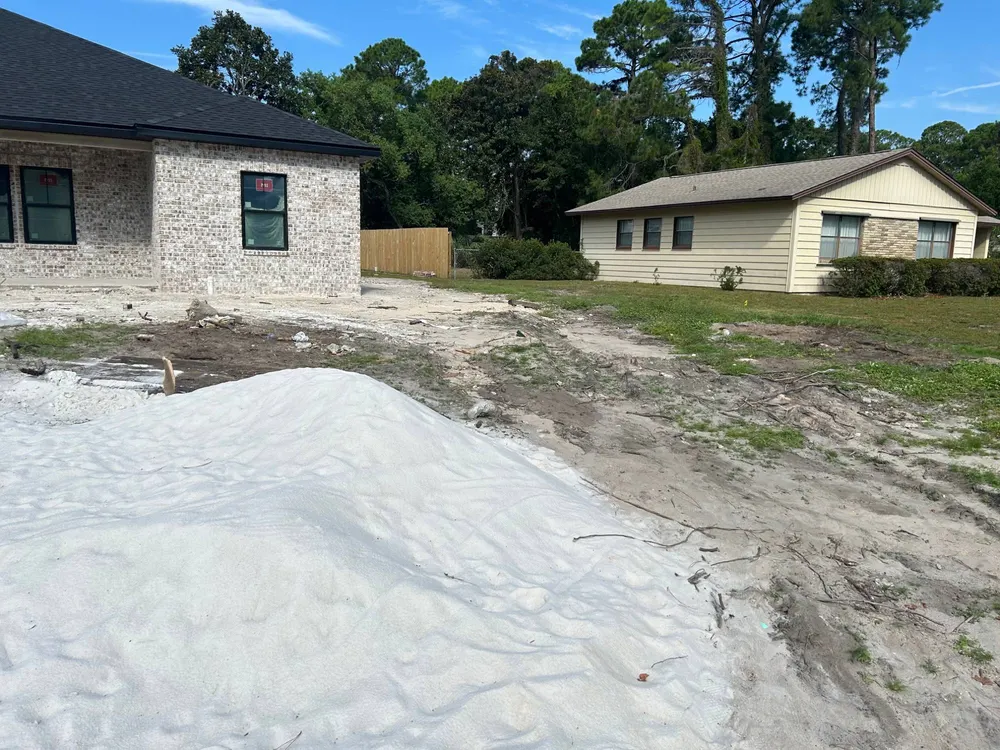 The side yard of the same new build, looking toward the neighbouring house